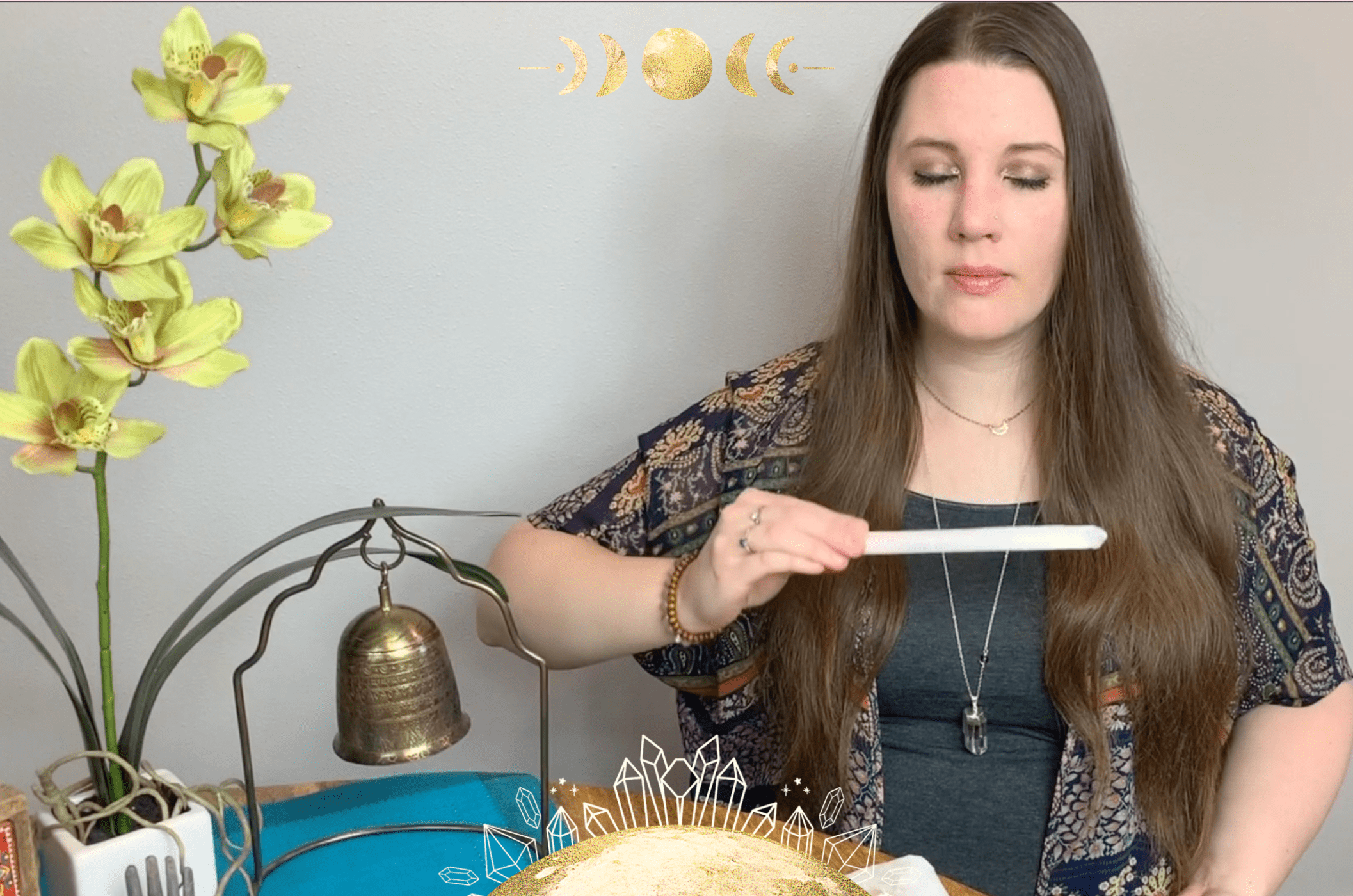 Photo of Ashley with a selenite wand