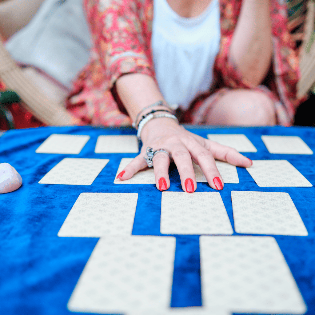 Oracle cards on a blue cloth 