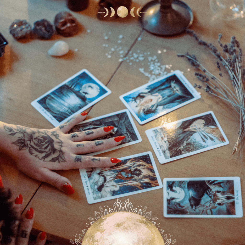 Finding Your Inner Compass with Oracle Cards. Photo of a hand on 6 tarot cards